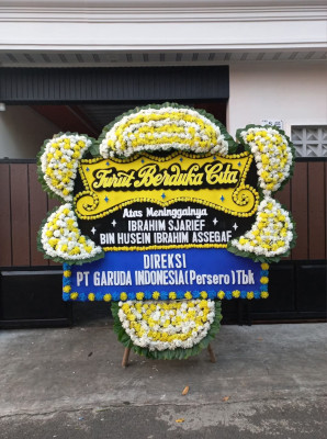 Papan Bunga Duka di Warsa