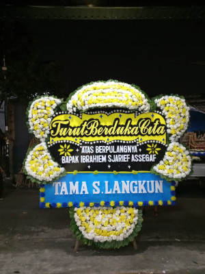 Papan Bunga Duka di Warsa