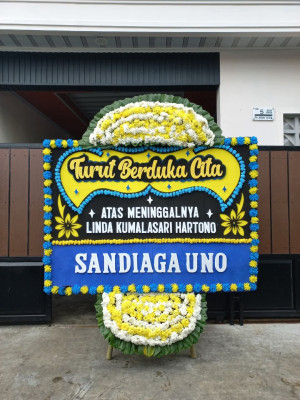 Papan Bunga Duka di Warsa